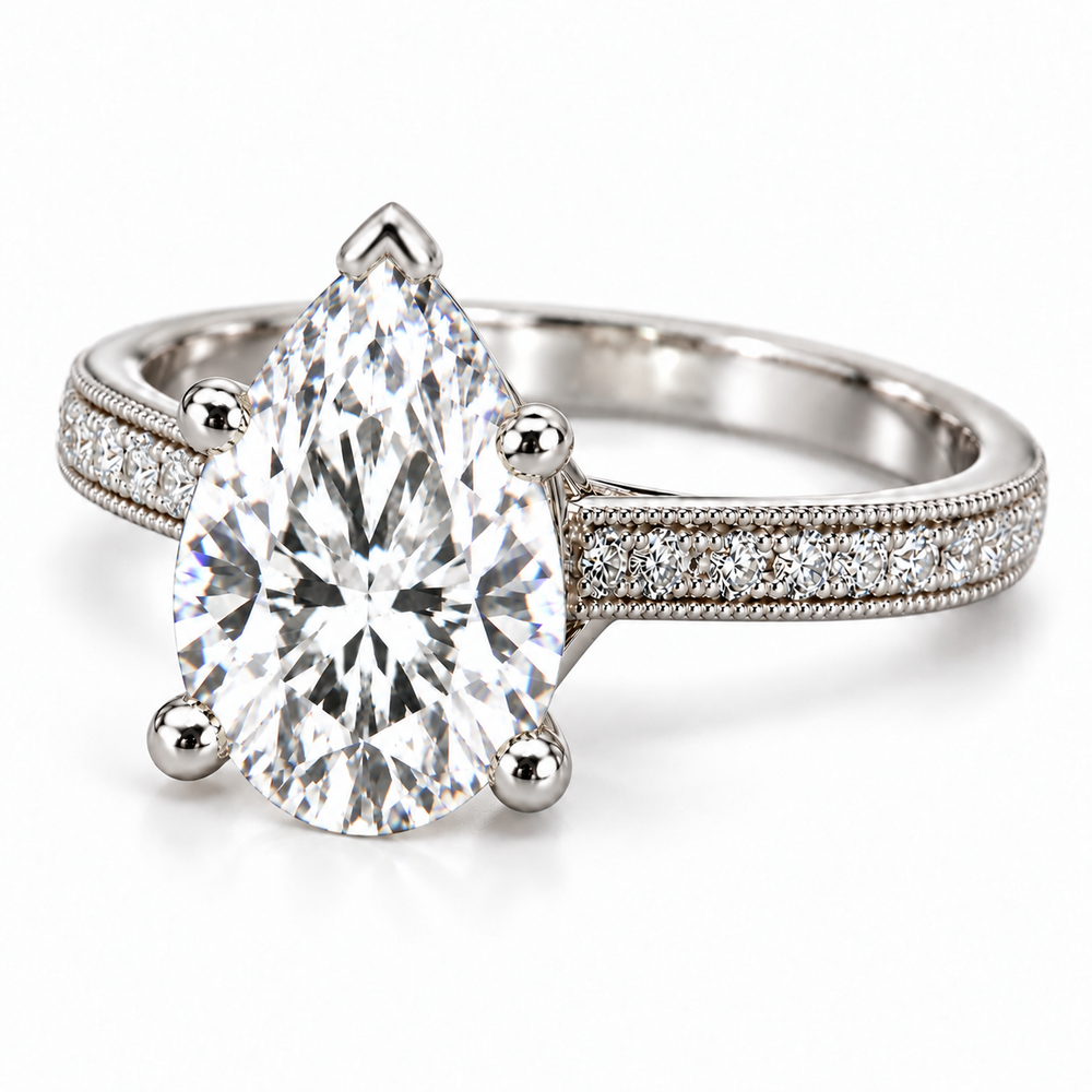Melden Samantha pear-cut diamond side-stone engagement ring in White Gold, angled view